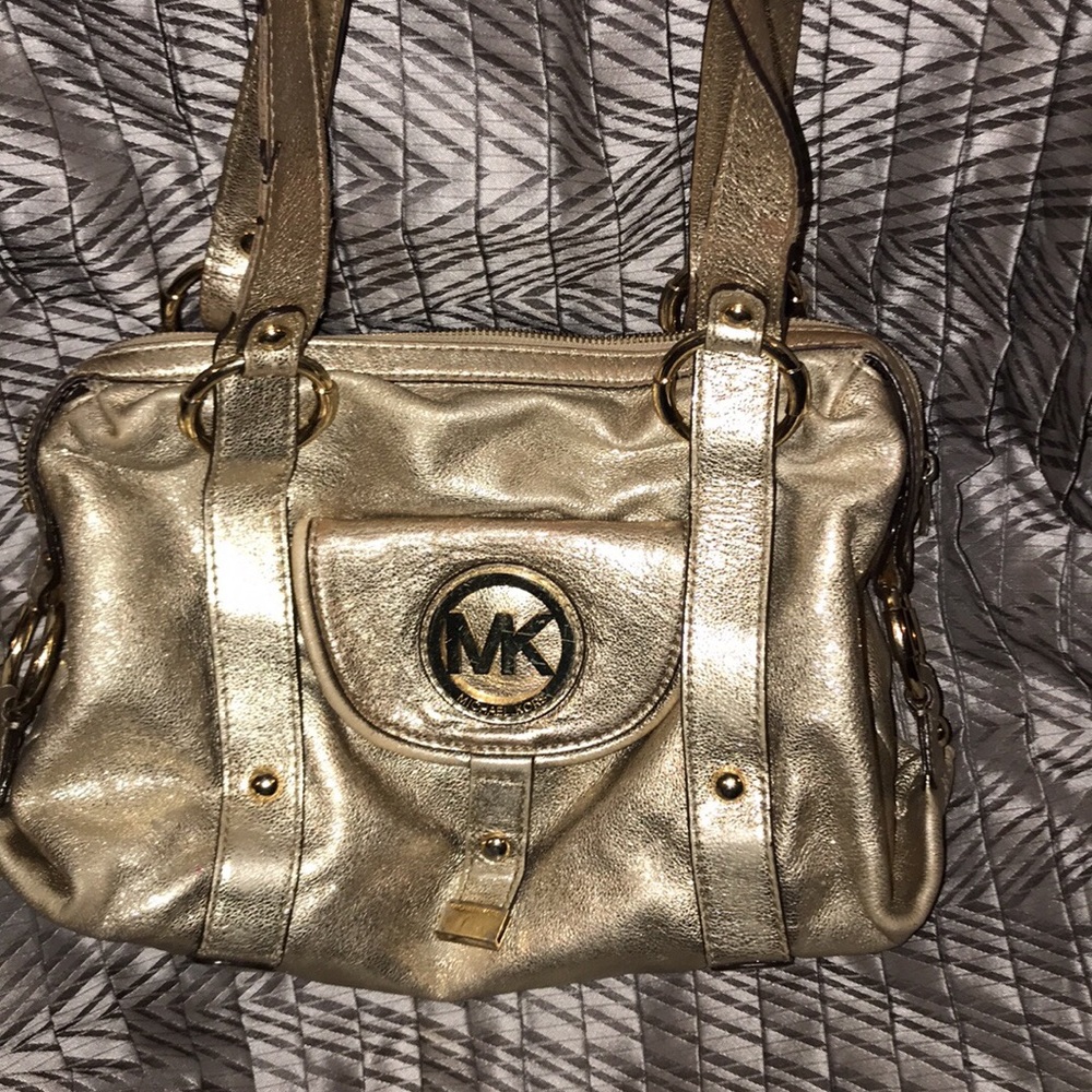 Michael Kors gold purse